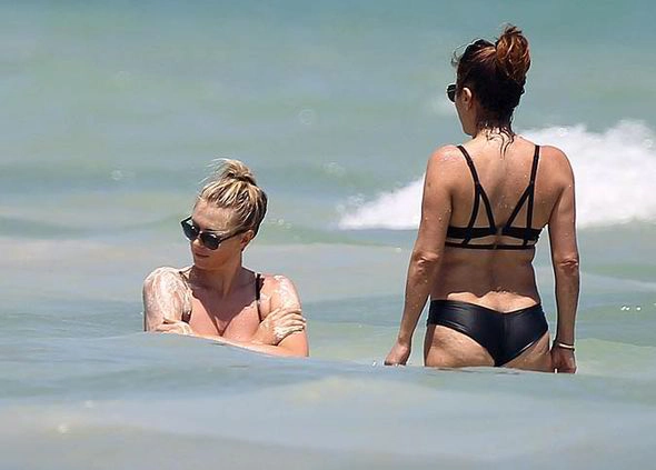 Maria Sharapova flaunts her impressive figure in revealing bikini during break in Mexico