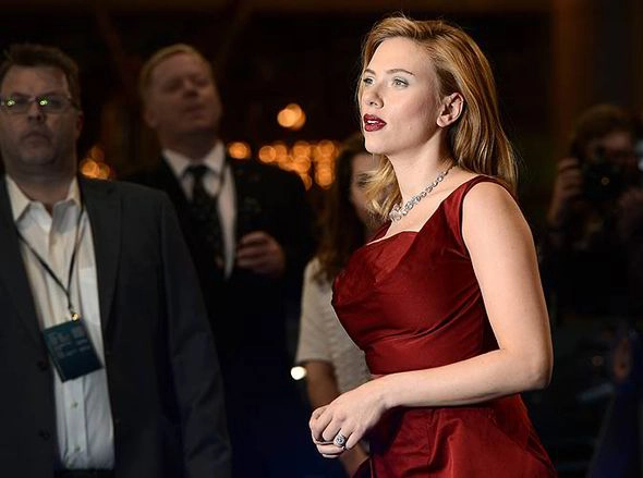 Scarlett Johansson shows off stunning figure and ample assets at Captain America premiere